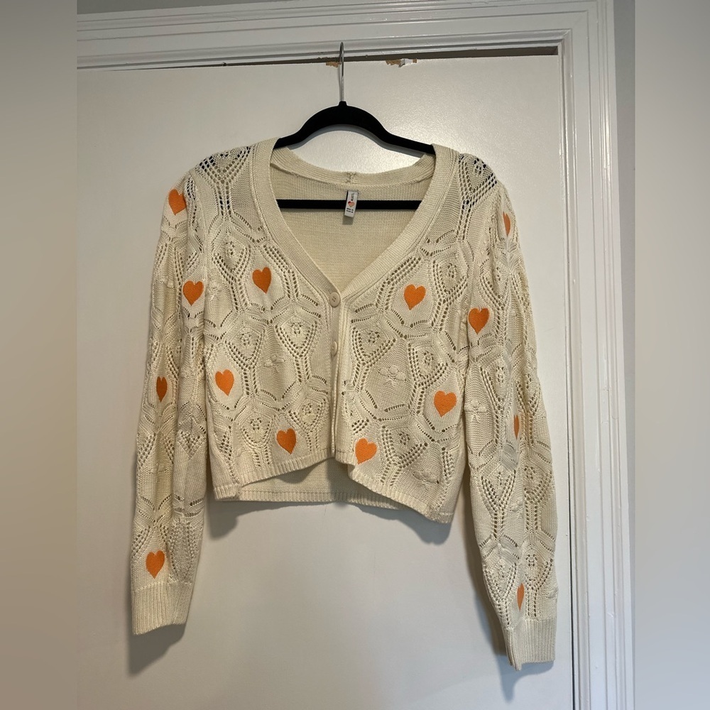 Blue Steel Medium Cream Open Knit Button cardigan w/ Orange Embroidered Hearts.